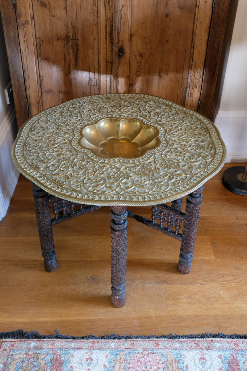 Anglo Indian Intricately Carved Table With A Decorative Brass Top