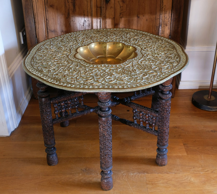 Anglo Indian Intricately Carved Table With A Decorative Brass Top