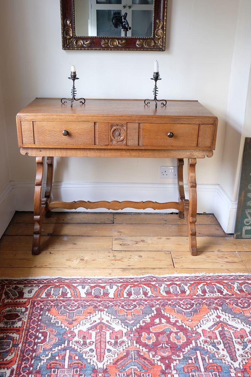 Arts & Crafts oak console table by Beresford & Hicks with two drawers and shaped trestle supports