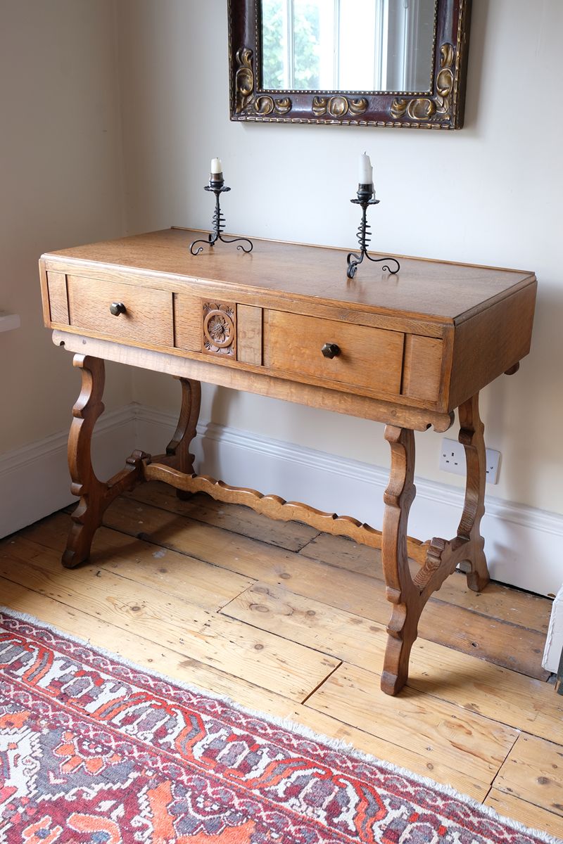 Arts & Crafts oak console table by Beresford & Hicks with two drawers and shaped trestle supports