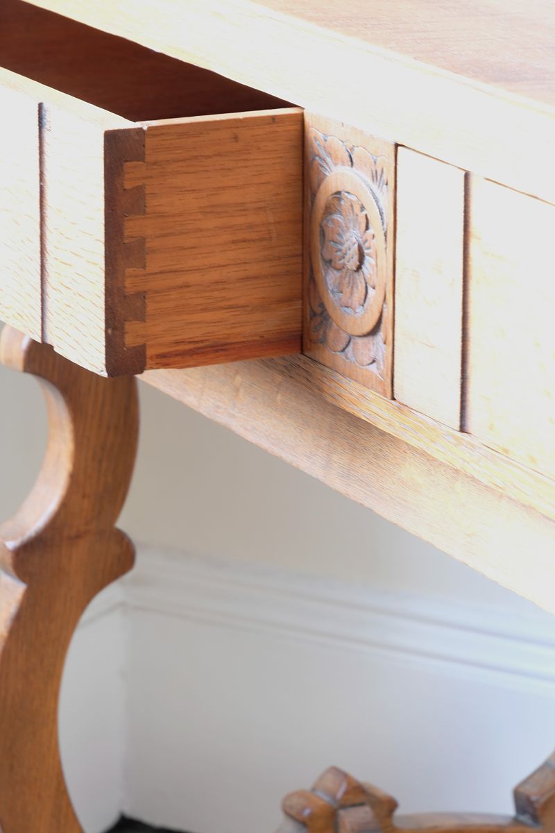 dovetail drawer box on the Arts & Crafts oak console table by Beresford & Hicks with two drawers and shaped trestle supports
