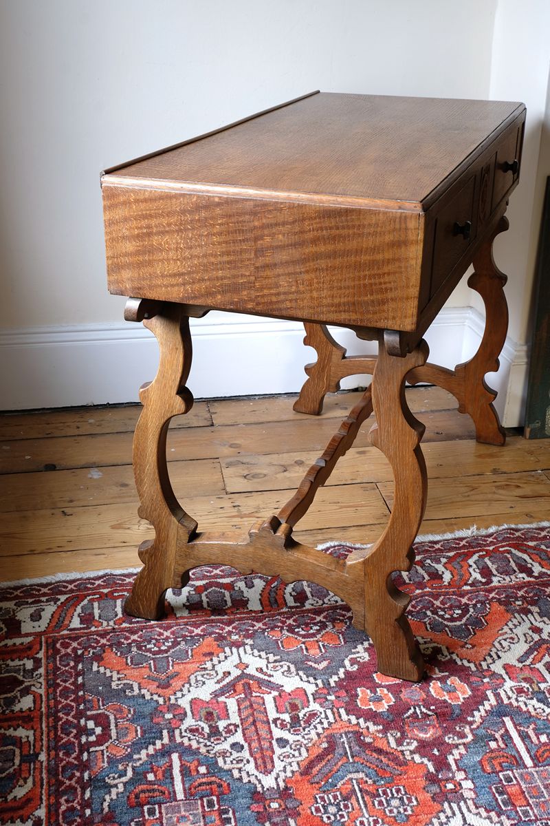 side grain on the Arts & Crafts oak console table by Beresford & Hicks with two drawers and shaped trestle supports