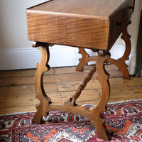 side grain on the Arts & Crafts oak console table by Beresford & Hicks with two drawers and shaped trestle supports