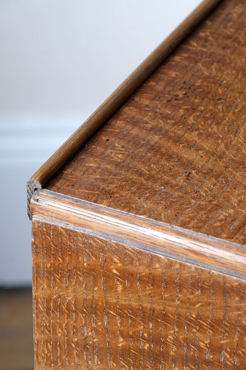 Tiny upstand on the Arts & Crafts oak console table by Beresford & Hicks with two drawers and shaped trestle supports