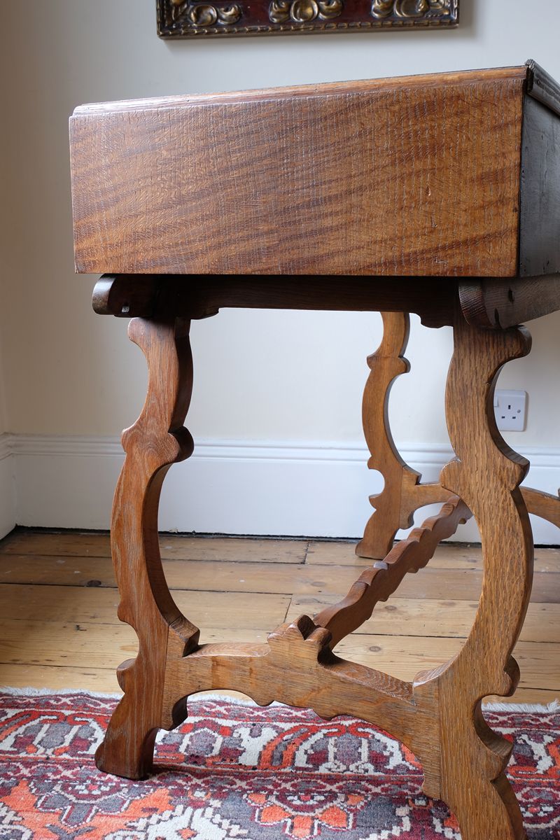 Arts & Crafts oak console table by Beresford & Hicks with two drawers and shaped trestle supports
