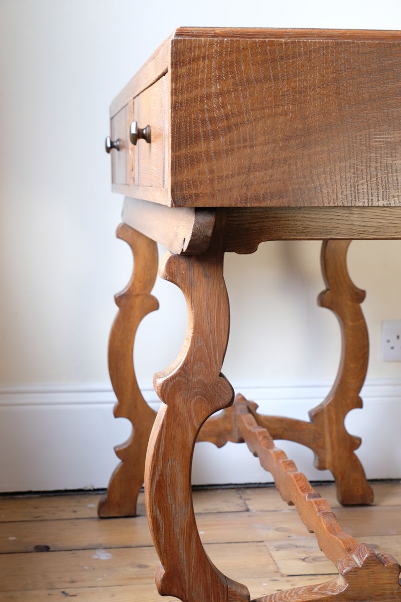 Arts & Crafts oak console table by Beresford & Hicks with two drawers and shaped trestle supports