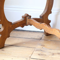 H ross stretchers on the Arts & Crafts oak console table by Beresford & Hicks with two drawers and shaped trestle supports