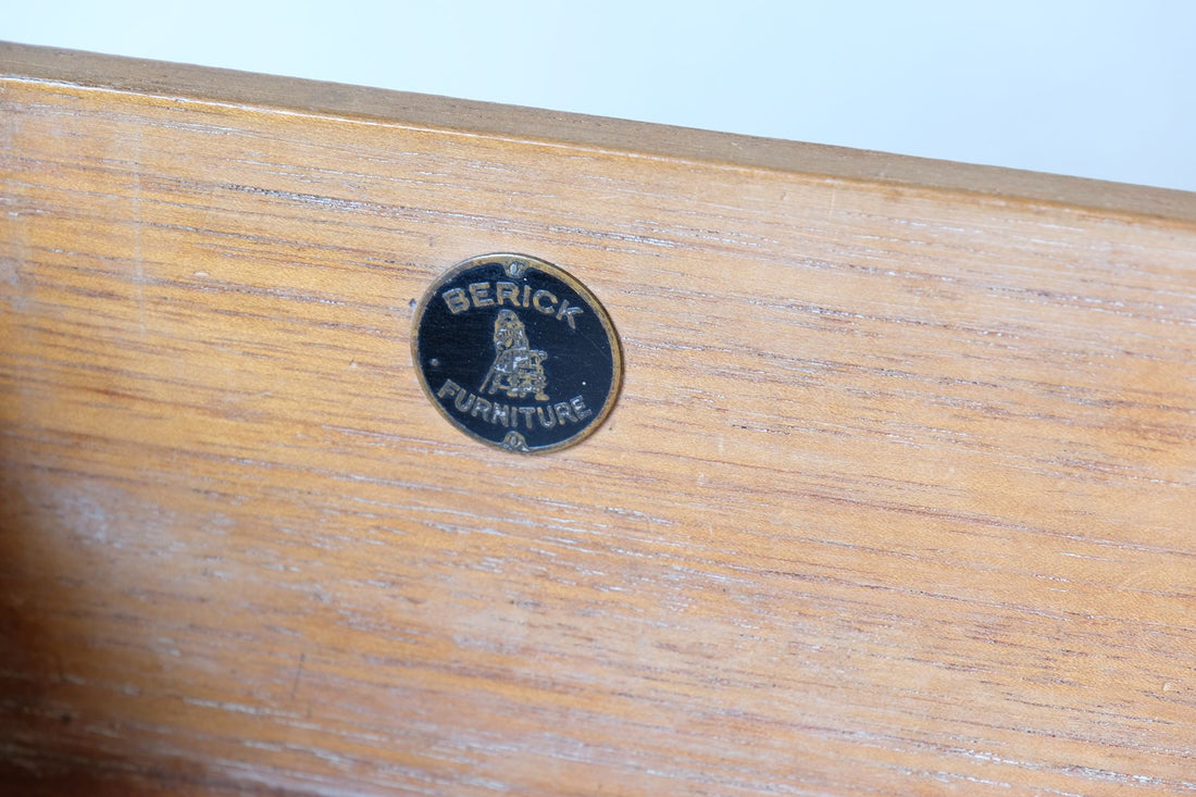 Berick name plate on the Arts & Crafts oak console table by Beresford & Hicks with two drawers and shaped trestle supports 