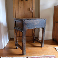 18th century country oak side table with a single panelled drawer, brass handles and baluster-turned front legs