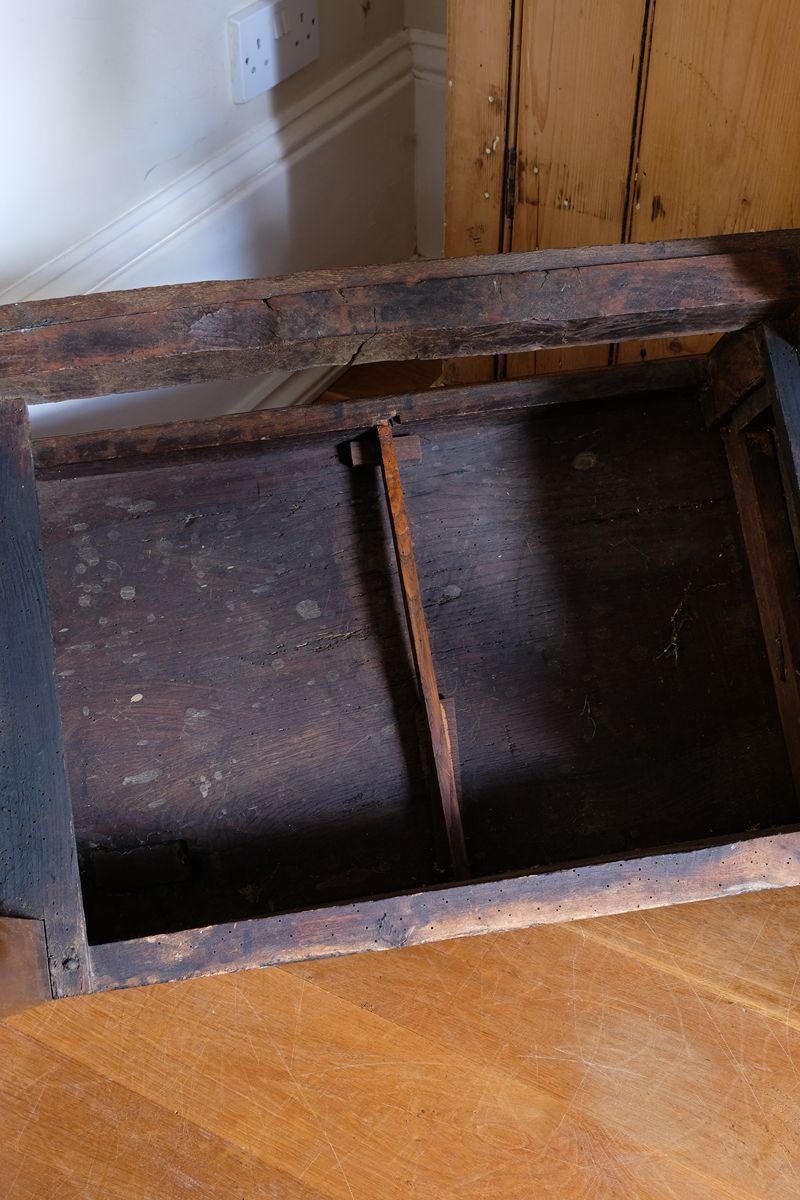 18th century country oak side table with a single panelled drawer, brass handles and baluster-turned front legs