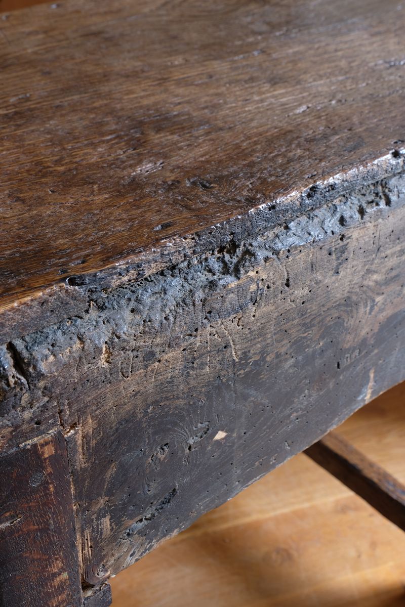 18th century country oak side table with a single panelled drawer, brass handles and baluster-turned front legs