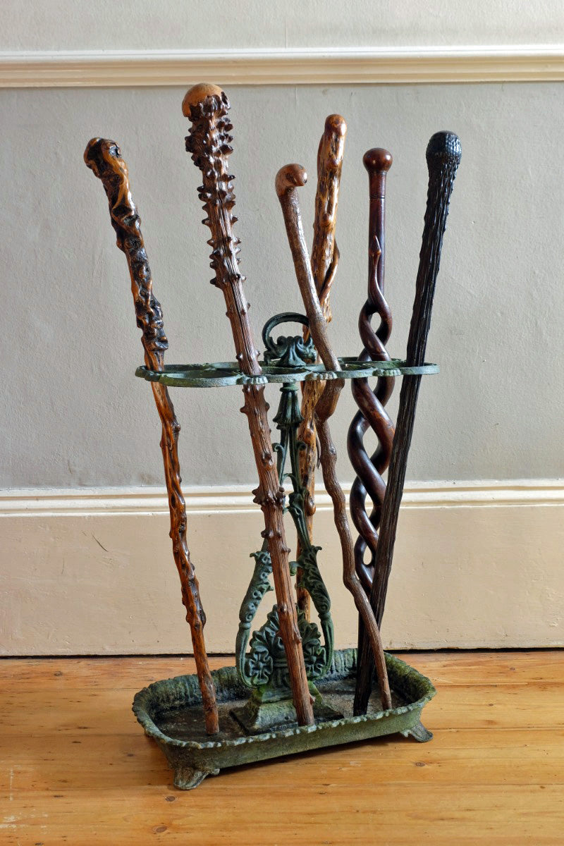 Mahogany walking stick in the form of entwined snakes