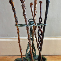 Mahogany walking stick in the form of entwined snakes