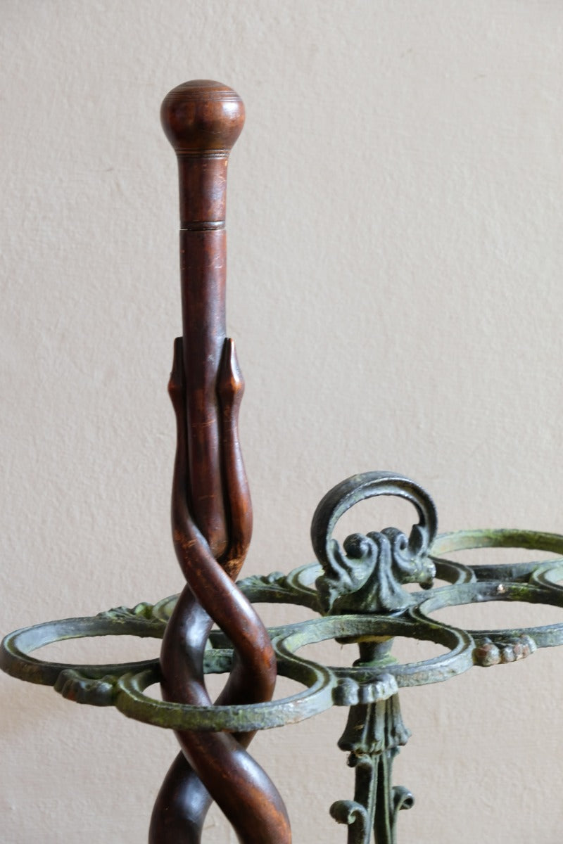 Mahogany walking stick in the form of entwined snakes