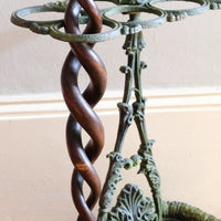 Mahogany walking stick in the form of entwined snakes