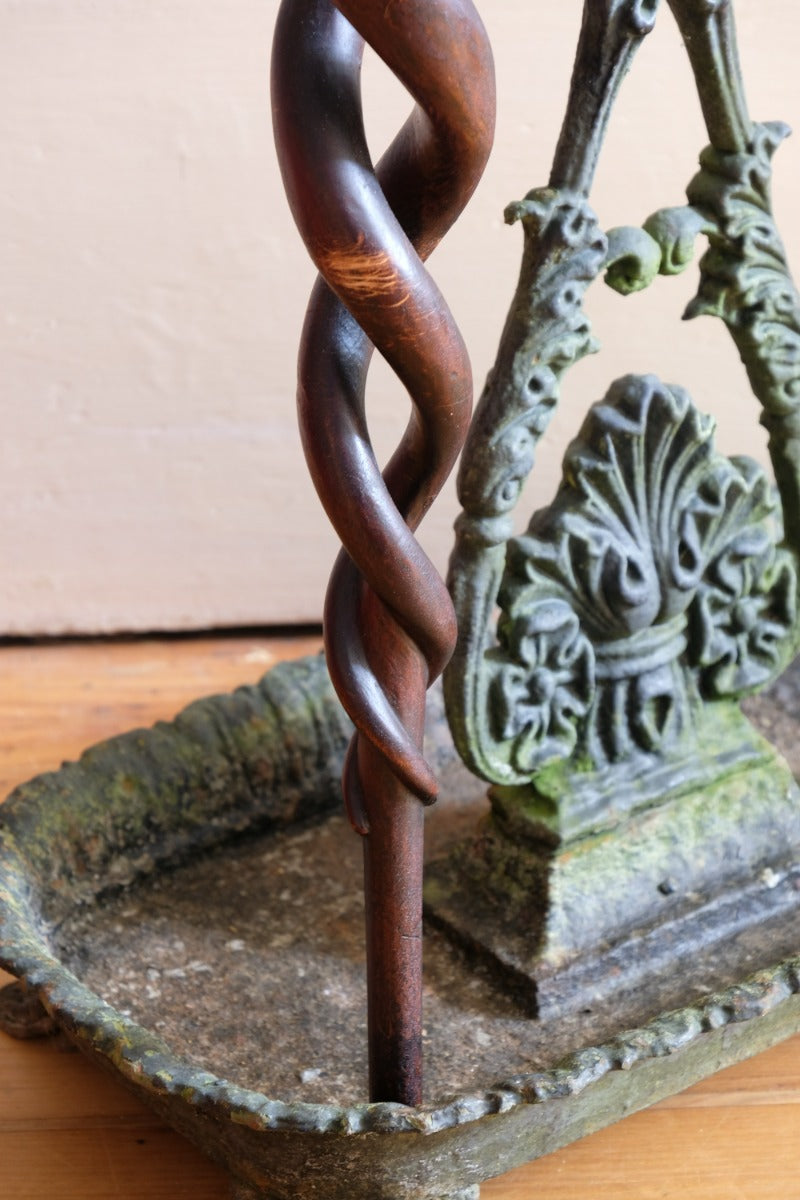 Mahogany walking stick in the form of entwined snakes