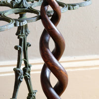 Mahogany walking stick in the form of entwined snakes