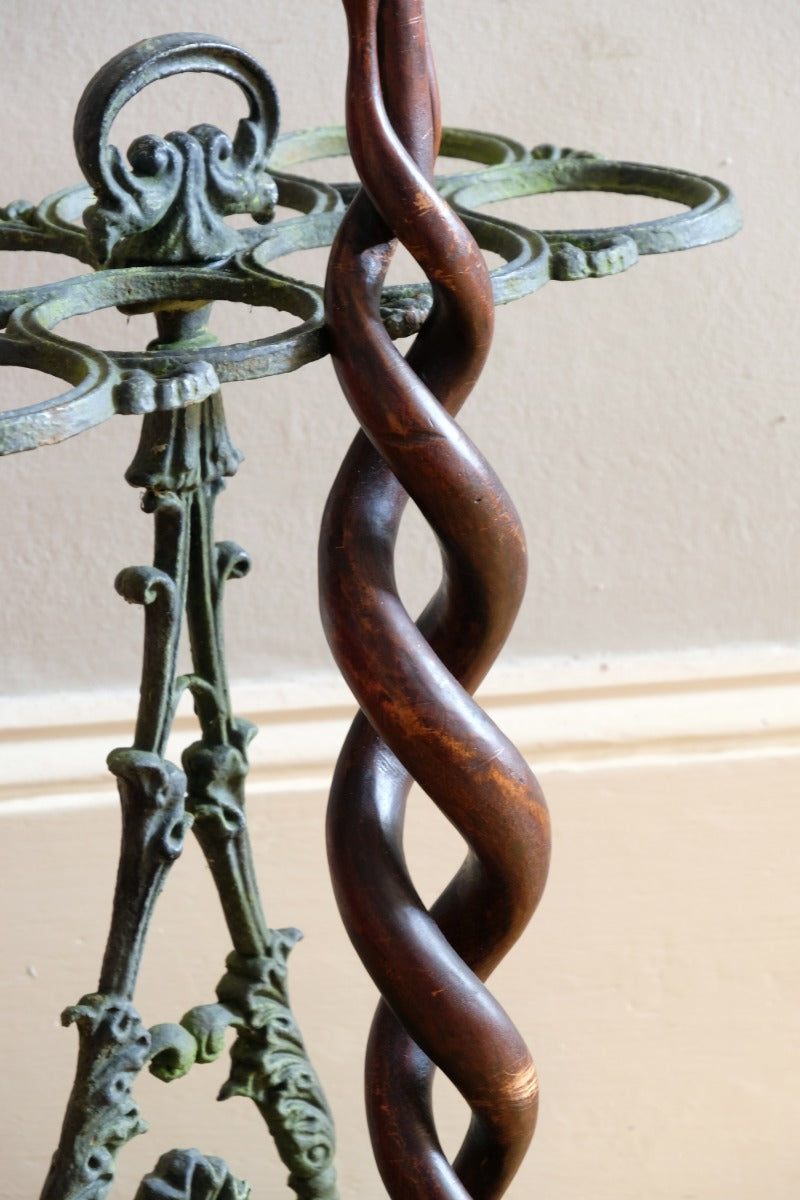 Mahogany walking stick in the form of entwined snakes