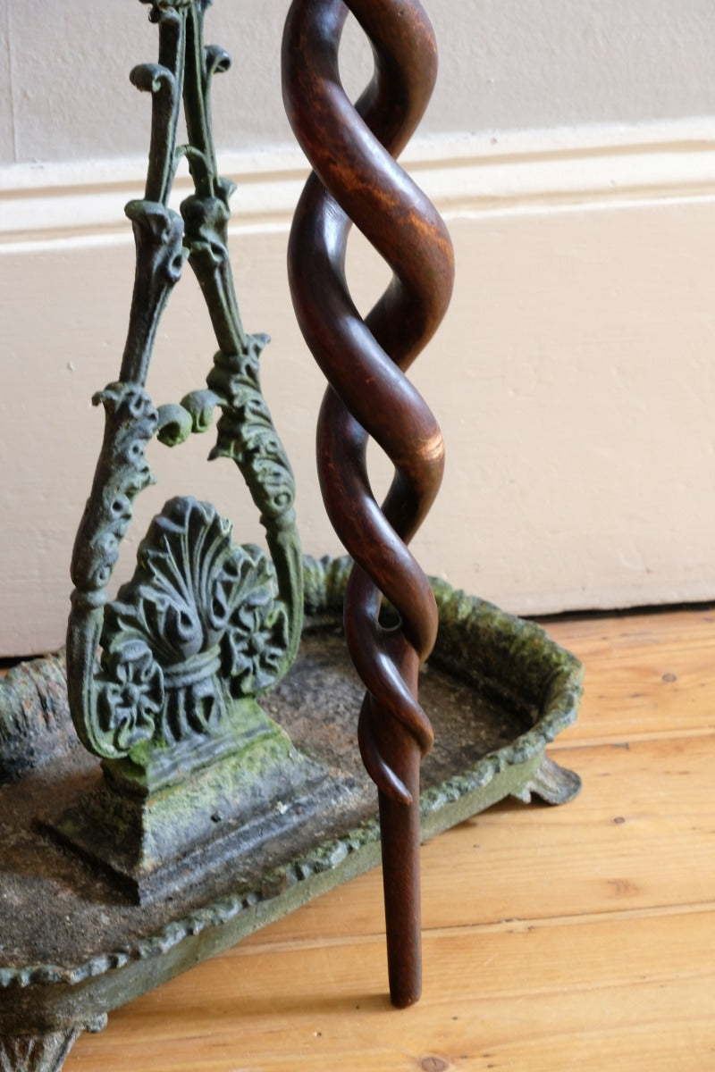 Mahogany walking stick in the form of entwined snakes