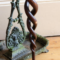 Mahogany walking stick in the form of entwined snakes