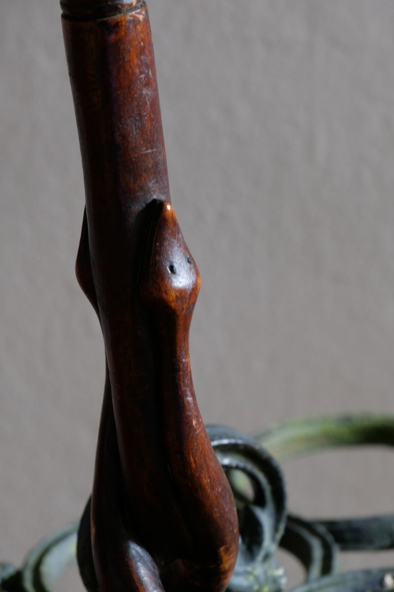 Mahogany walking stick in the form of entwined snakes