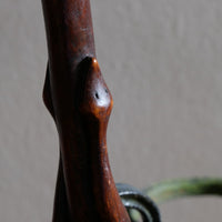 Mahogany walking stick in the form of entwined snakes