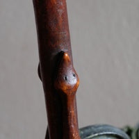 Mahogany walking stick in the form of entwined snakes