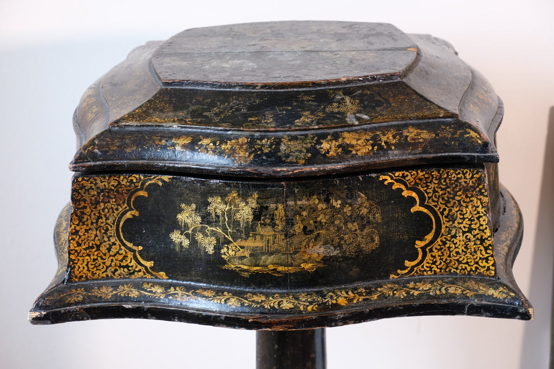 Chinoiserie Teapoy table with a serpentine sarcophagus-shaped top