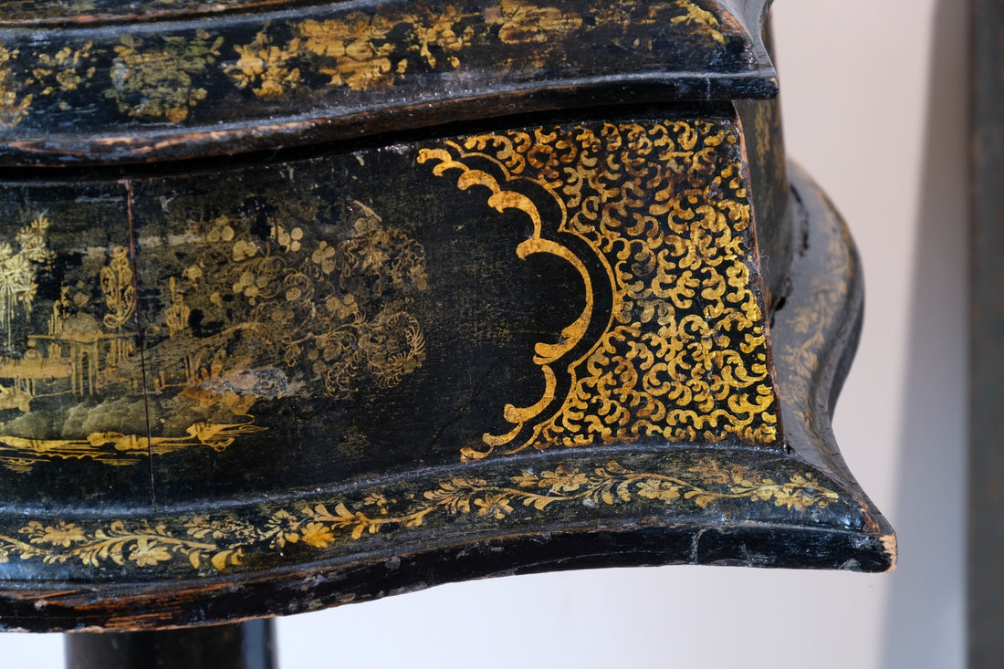 Chinoiserie Teapoy table with a serpentine sarcophagus-shaped top