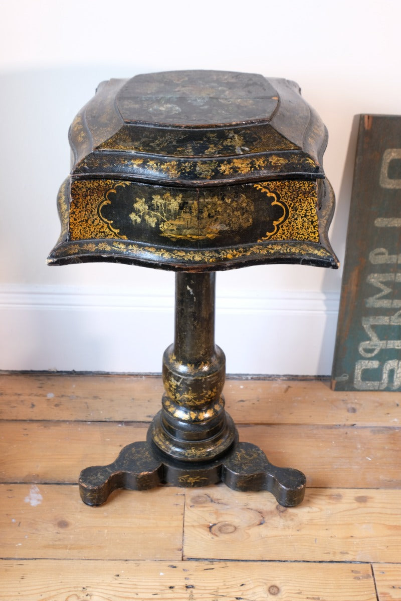 Chinoiserie Teapoy table with a serpentine sarcophagus-shaped top