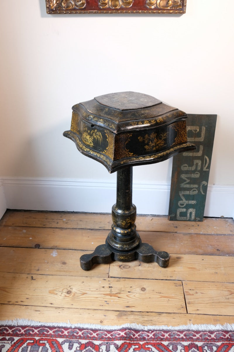 Chinoiserie Teapoy table with a serpentine sarcophagus-shaped top