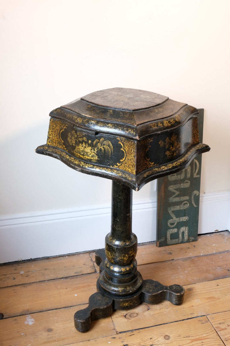Chinoiserie Teapoy table with a serpentine sarcophagus-shaped top
