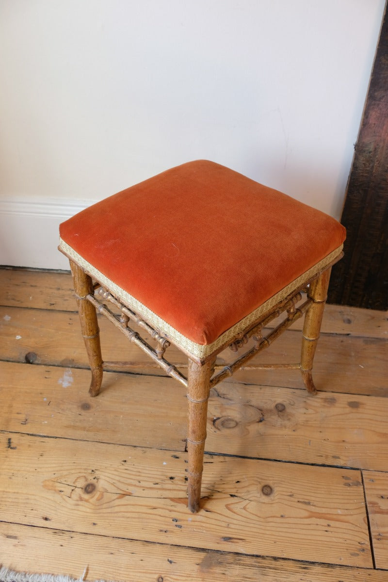 Regency giltwood faux bamboo music stool with swept out legs