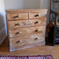 Antique pine chest of graduated drawers