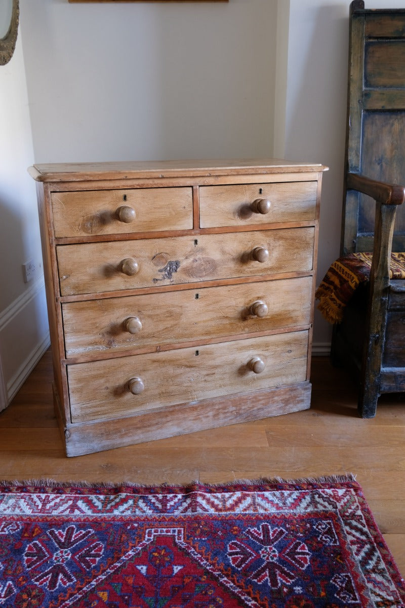 Antique pine chest of graduated drawers