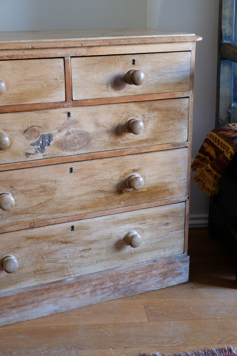 Antique pine chest of graduated drawers