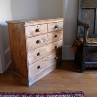 Antique pine chest of graduated drawers