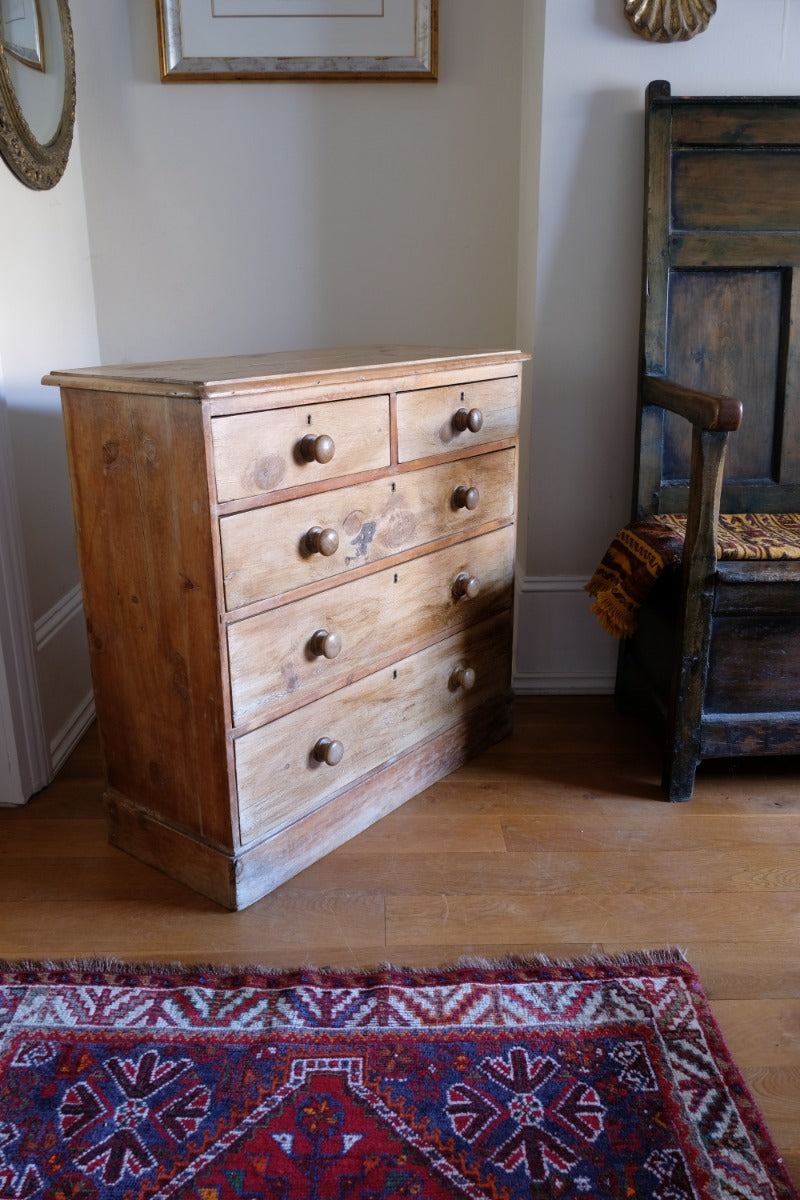 Antique pine chest of graduated drawers