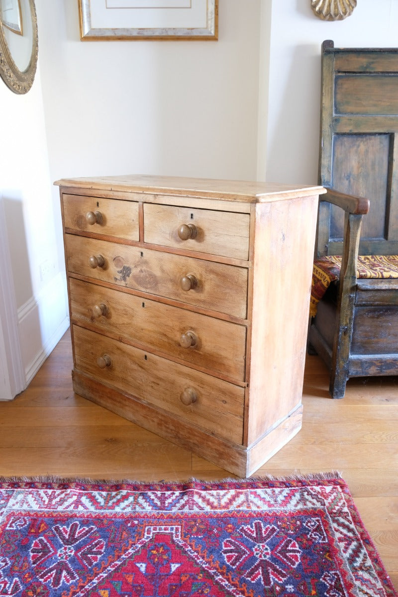 Antique pine chest of graduated drawers