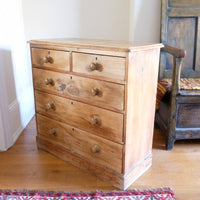 Antique pine chest of graduated drawers