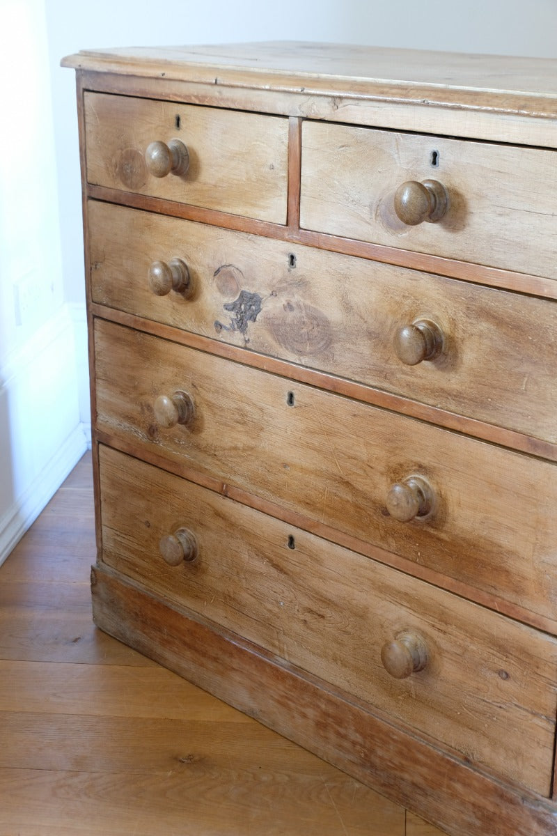 Antique pine chest of graduated drawers