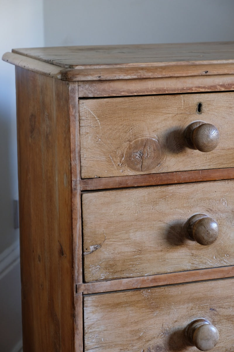 Antique pine chest of graduated drawers