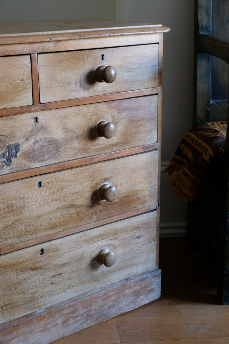 Antique pine chest of graduated drawers