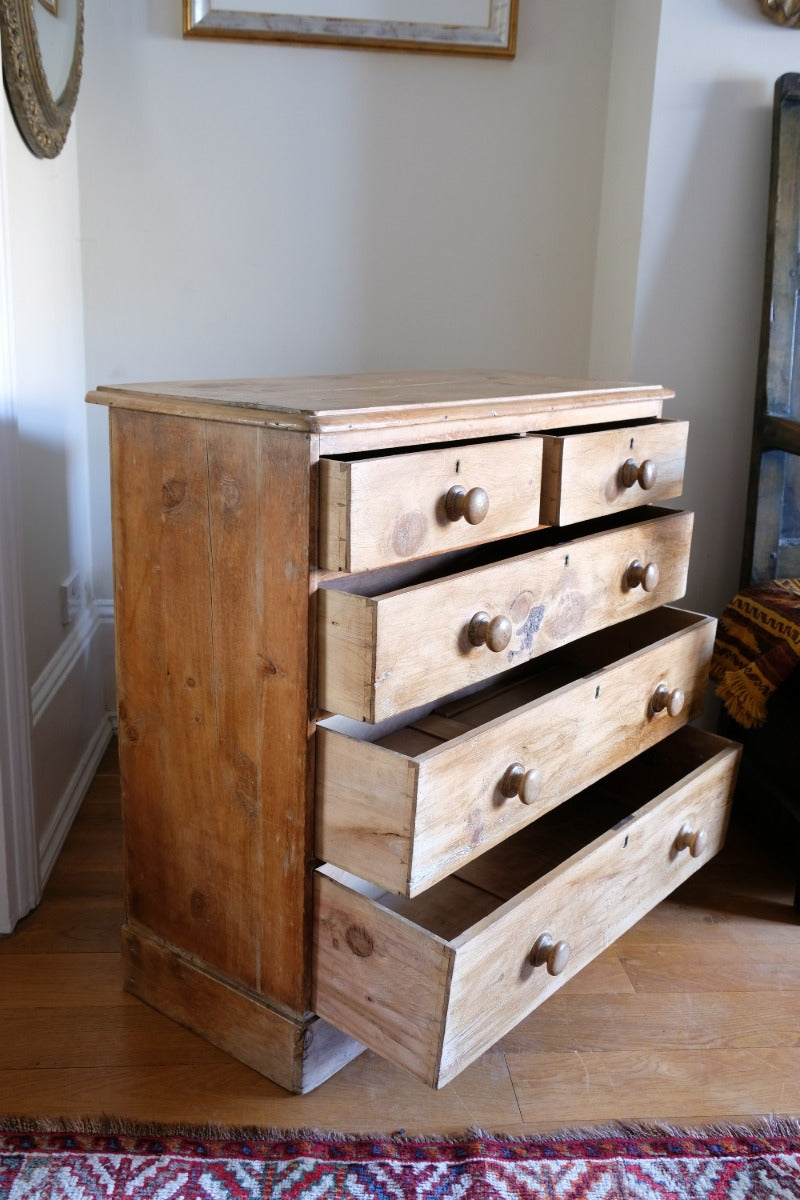 Antique pine chest of graduated drawers