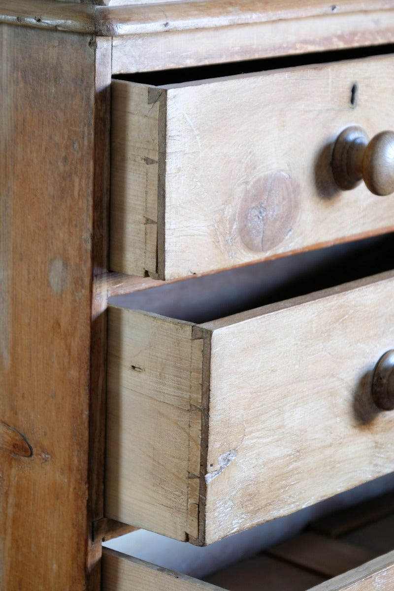 Antique pine chest of graduated drawers